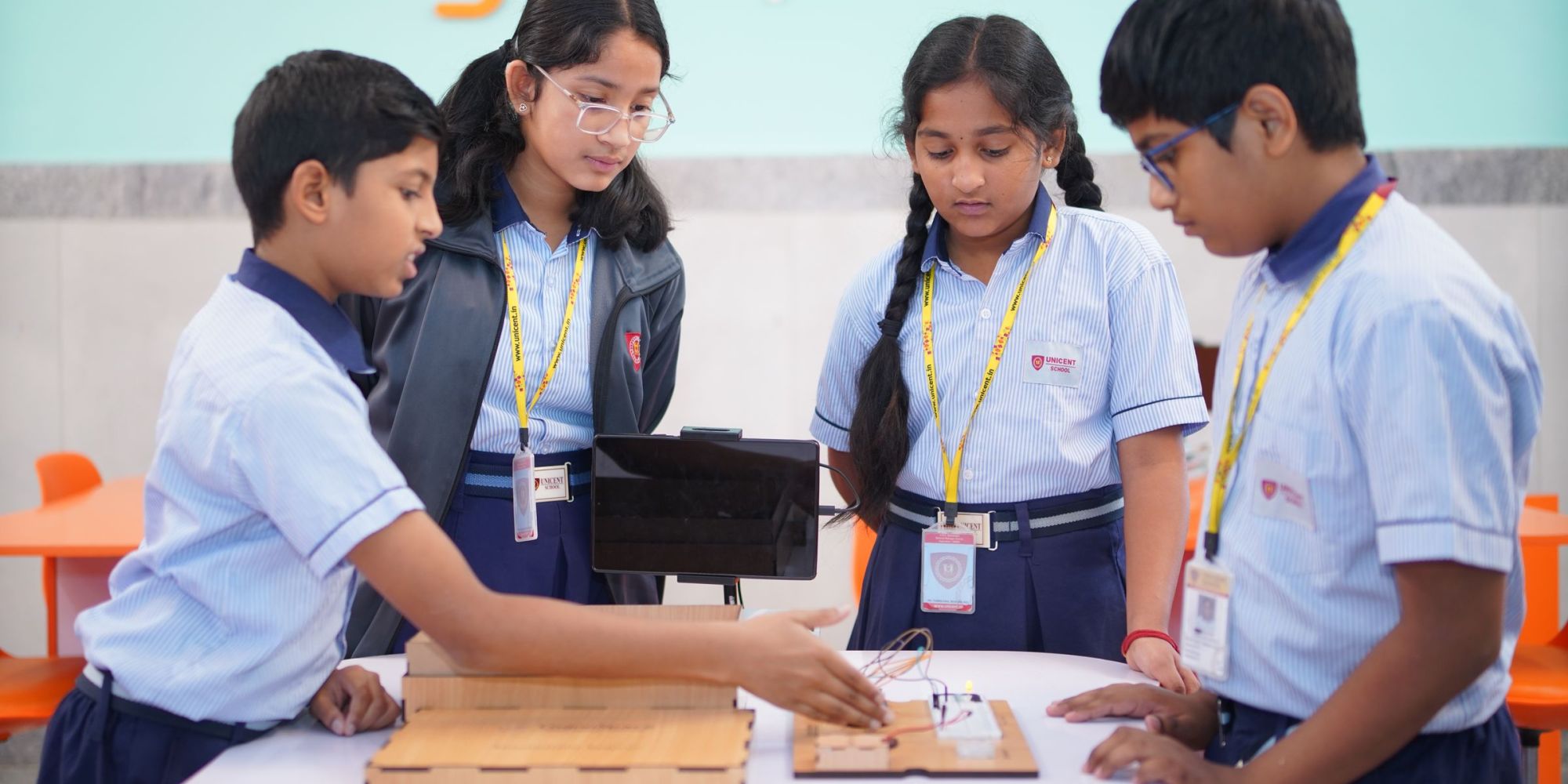 Students working together on a hands-on project in class